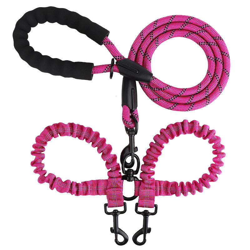 Double ended retractable lead for walking two dogs from one handle