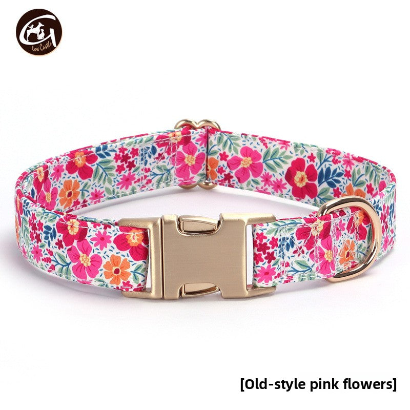 Floral fabric dog collar with gold buckle in Purple Floral Collar, top view