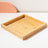 Square ceramic pet dishes on a raised bamboo feeding tray, view 13