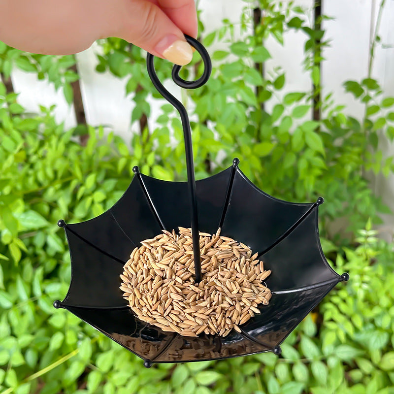 Umbrella-shaped bird feeder