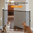Small dog behind a portable no-drill pet fence