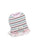 Small dog wearing a bright rainbow striped dress