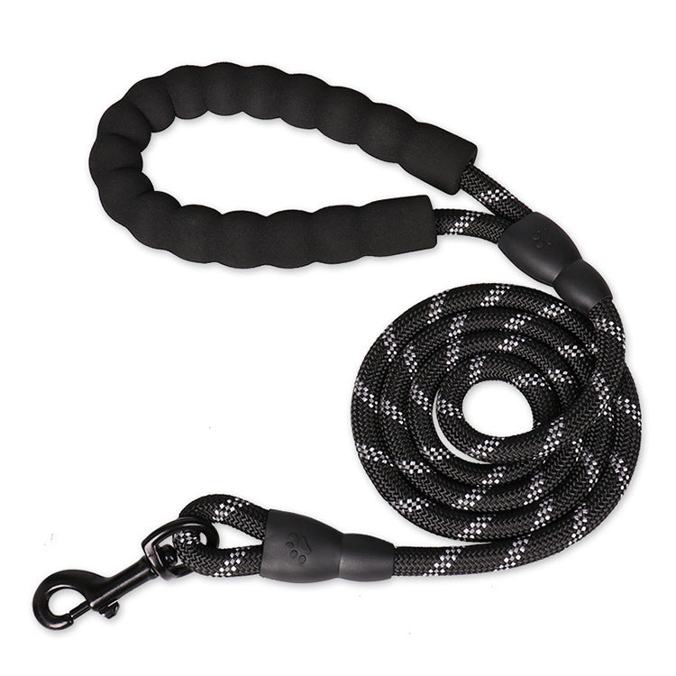 Reflective nylon dog lead in fluorescent green on a walk