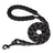 Reflective nylon dog lead in fluorescent green on a walk