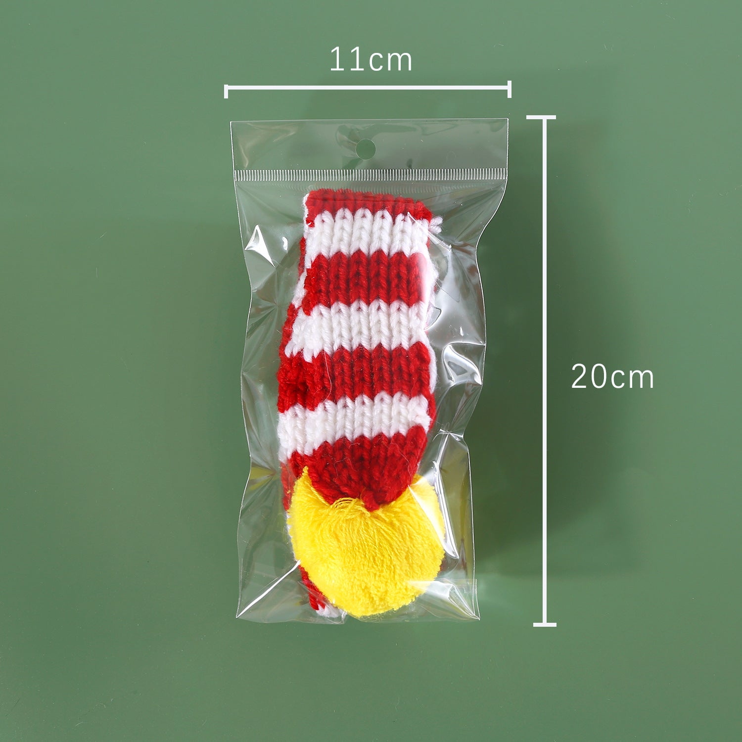 Knitted Christmas pet scarf with red and white festive stripes, view 5