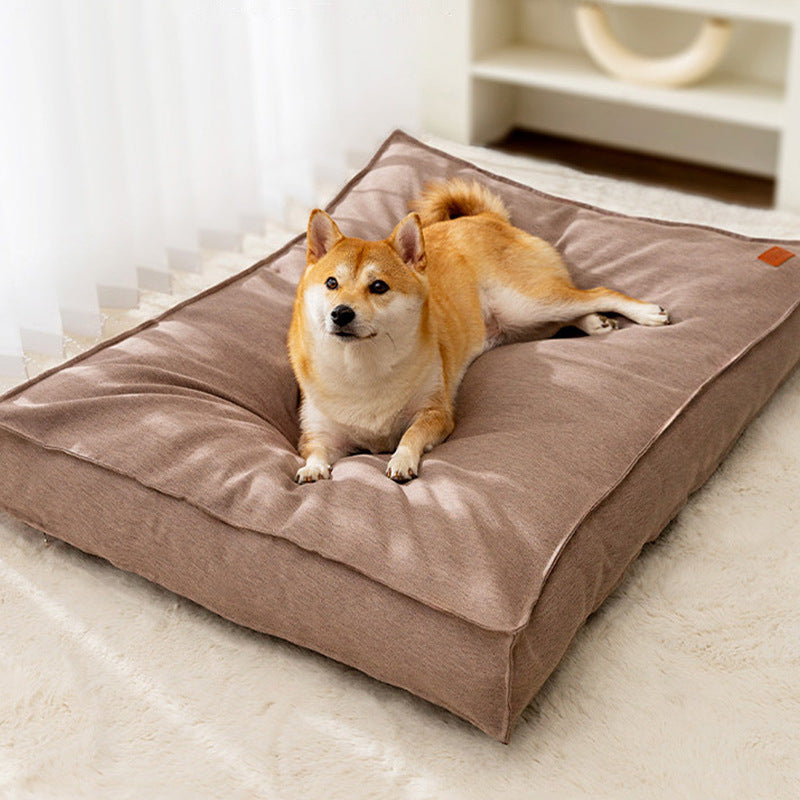 Waterproof dog bed pad with removable washable cover, close-up detail view