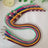 Hand braided Christmas pattern pet lead in bright orange