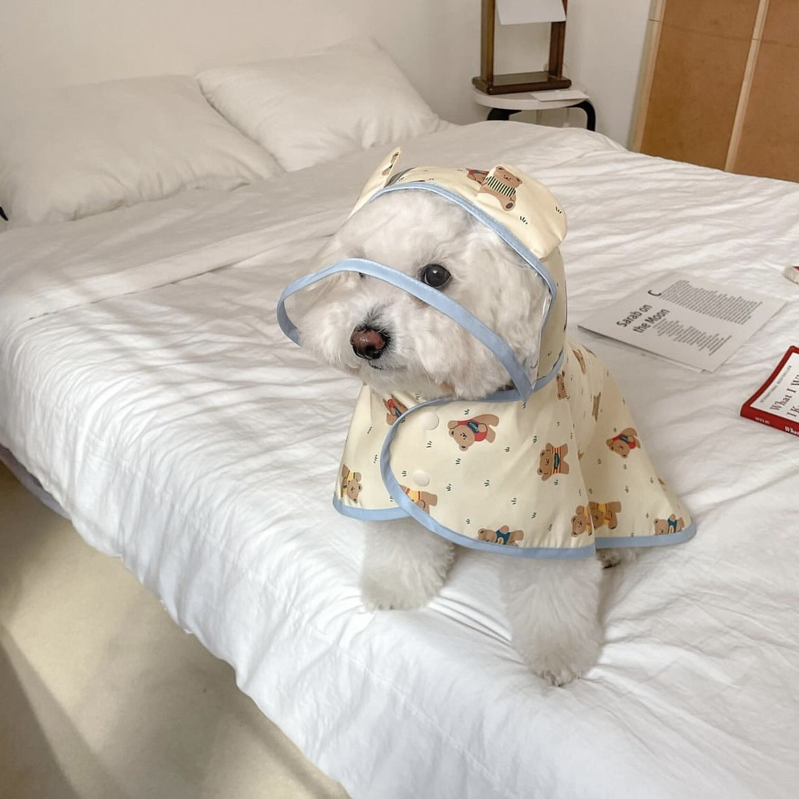 Hooded waterproof dog rain poncho with bear print in Navy Blue Bear, close-up detail