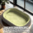 Removable washable pet bed in green for dogs