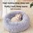 Round plush donut cat bed with raised rim, view 1