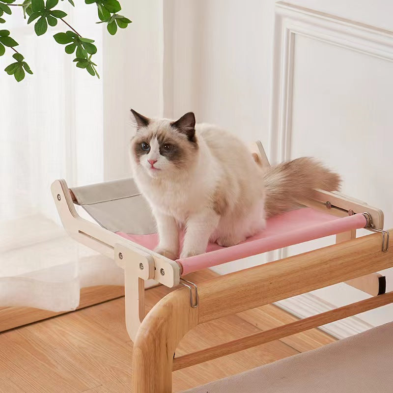 Wall mounted wooden cat hammock with removable padded mat, view 1 of 12