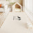 Waterproof PVC dog crate mat in Woof Takeoff, size 70 x 140cm
