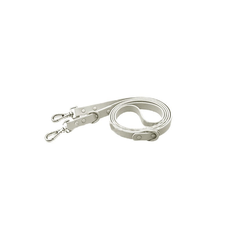 Reflective PVC vest harness for small and medium dogs on a wet walk