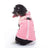 Reflective waterproof dog coat with lamb fleece lining in Pink, in a home setting