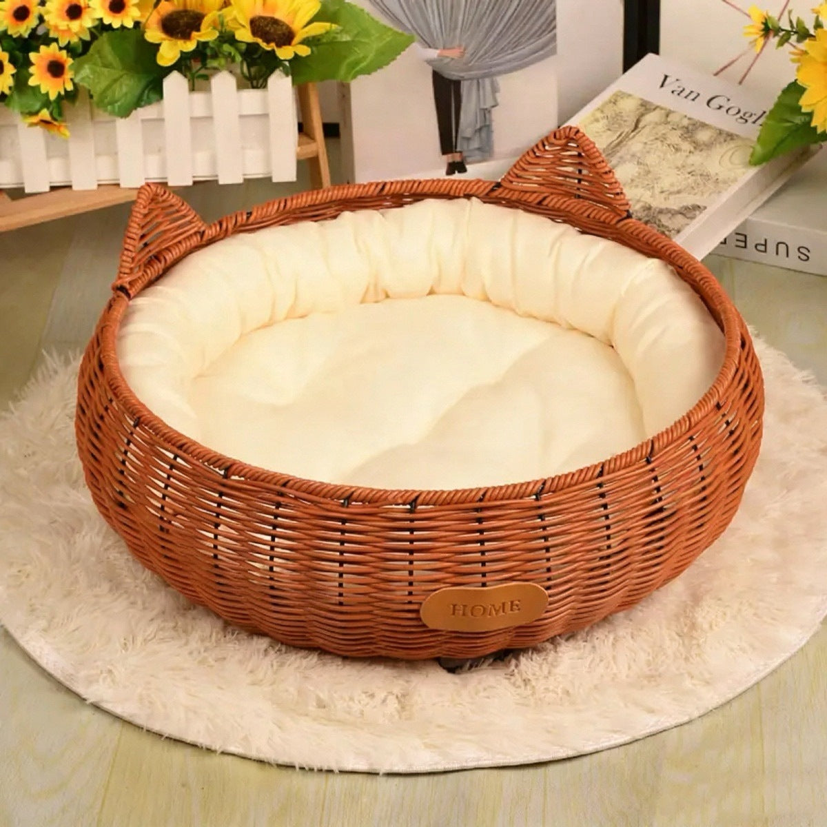 Brown rattan woven pet bed with blue cushion for cats, view 4