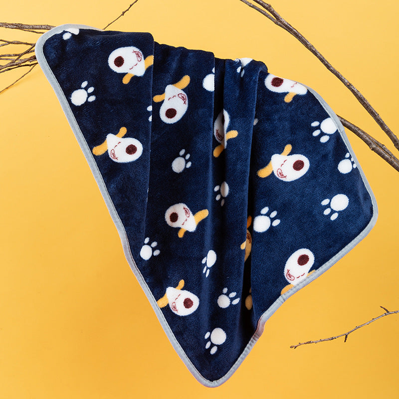 Soft flannel pet blanket with navy paw print