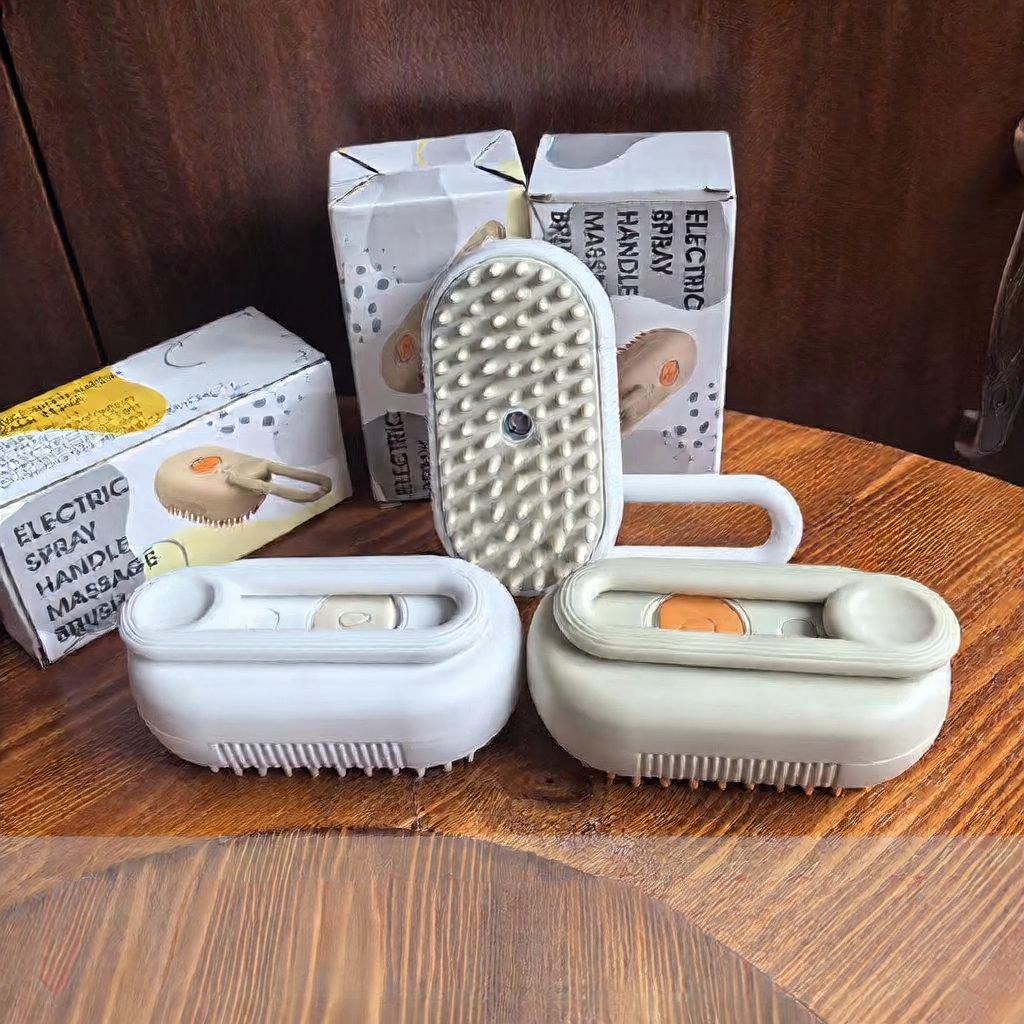 Pet spray massage brush for dogs and cats in Porcelain White, showing size and shape