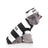 Small dog in a Christmas penguin costume with velcro fastening