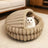 Thick plush semi-enclosed cat bed with waterproof base, detail photo 4