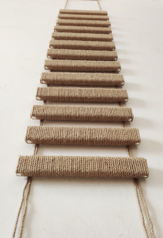 Cat climbing ladder and bridge with sisal steps, further angle view