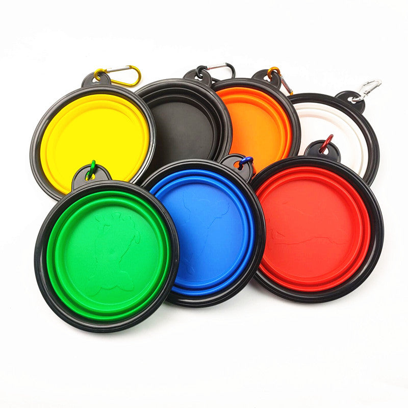 Collapsible silicone travel dog bowl in red folded flat
