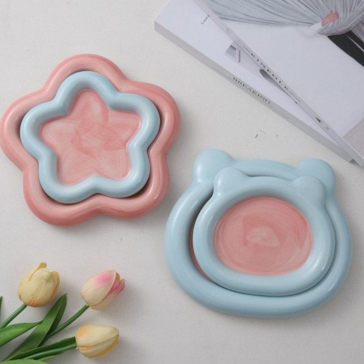Glazed ceramic pet food plate with bear design in blue and pink, view 4