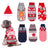 Small dog in a red reindeer knitted Christmas jumper