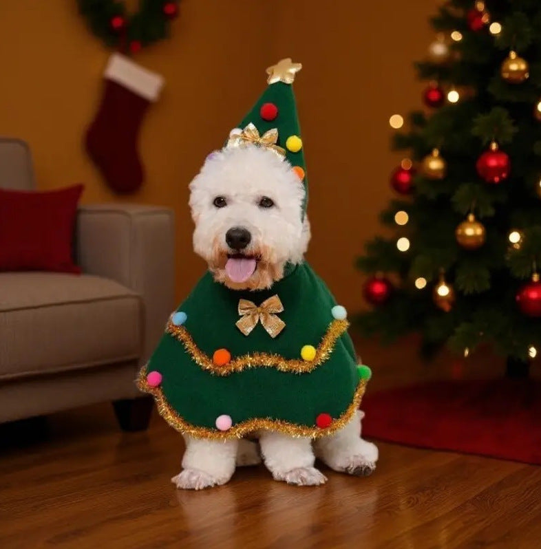 Green festive dog cape with cartoon Christmas design