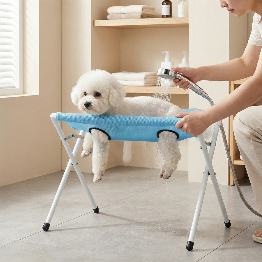 Foldable stainless steel dog washing station in blue for home grooming