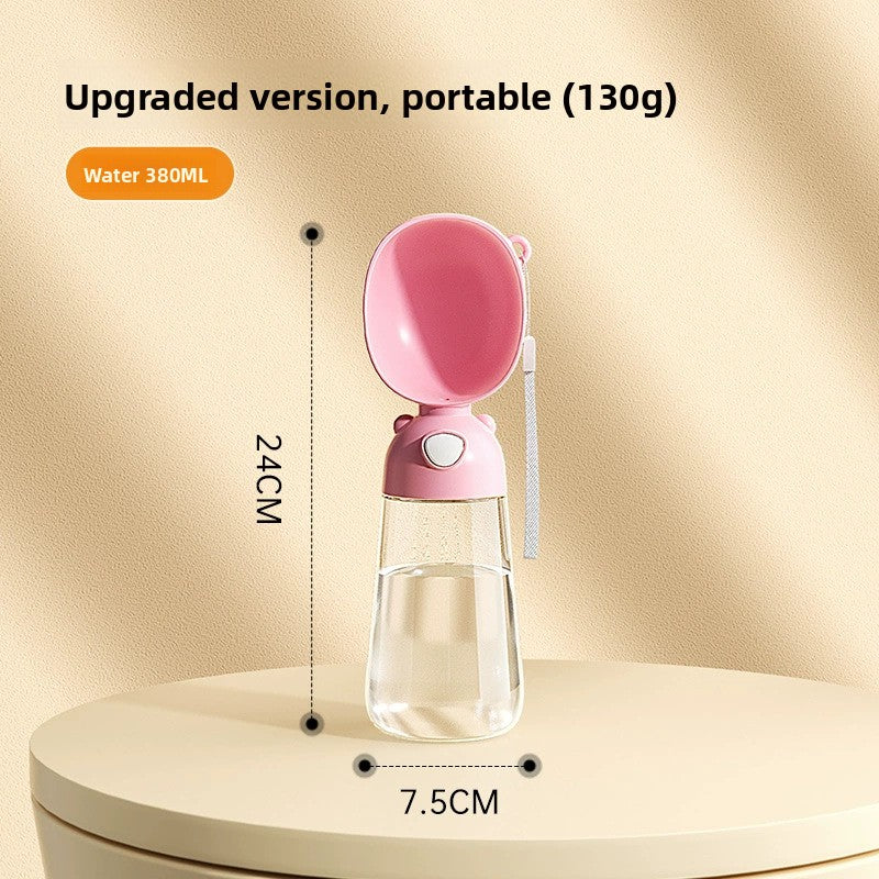Portable dog water bottle cup with leakproof seal, in use with a pet