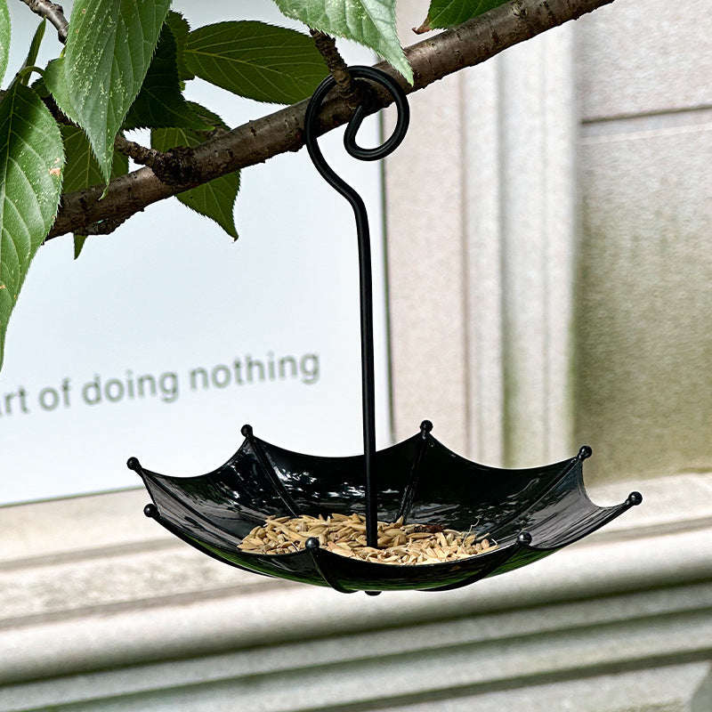 Umbrella-shaped bird feeder