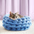 Soft velvet hand-woven round knot pet bed, shown in 14 colours and styles