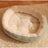 Green oval dog bed in 70 by 55cm size