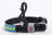 LED light up pet collar with black striped strap and red glow