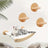 Cat leaping onto a round wall jumping platform