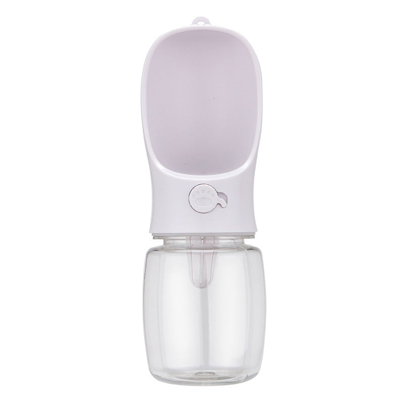 Leakproof dog walking water bottle in Blue 550ml with Food, in use with a pet