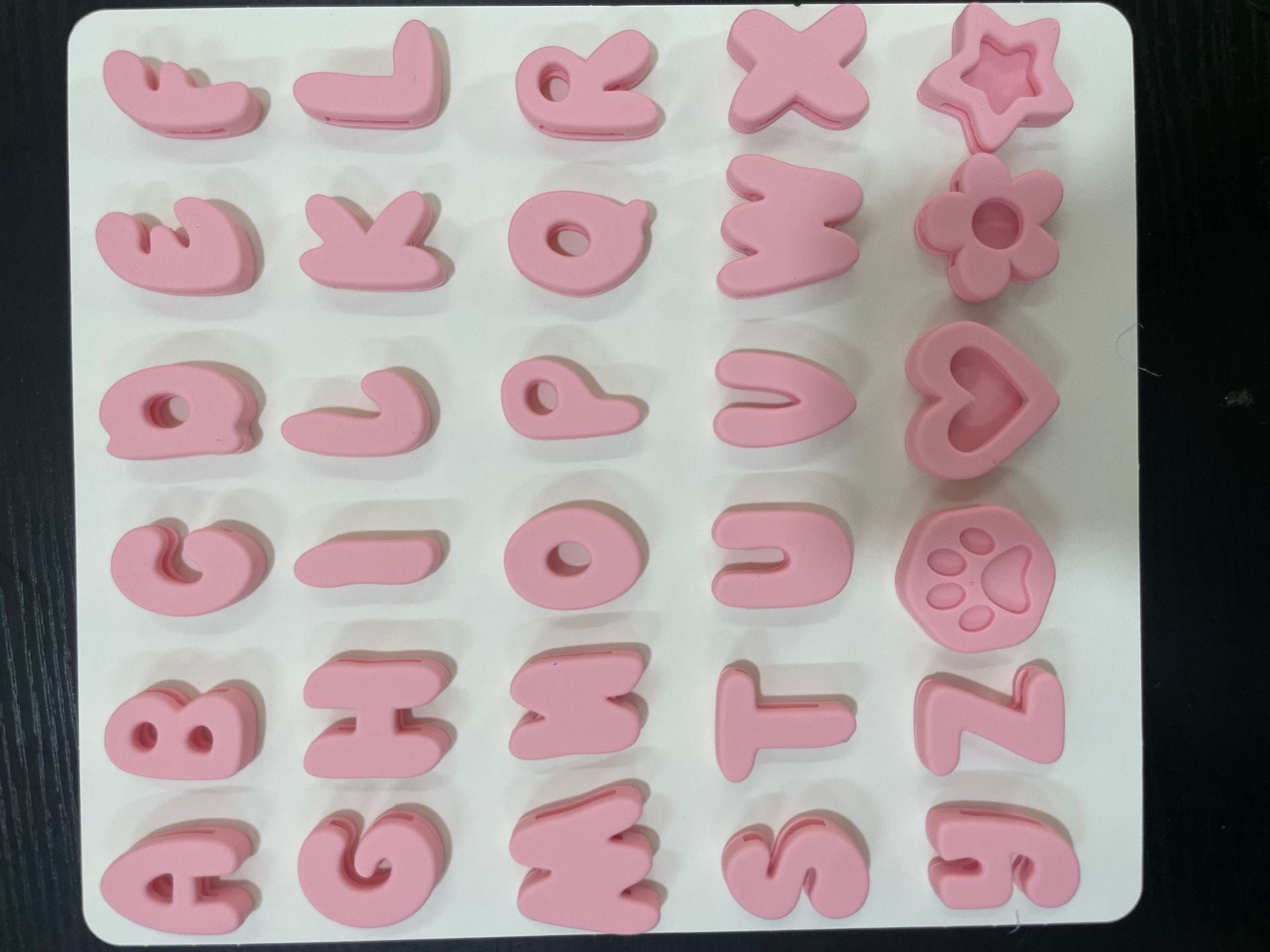 Silicone letter slides for pet collars, available from Pet Royale UK