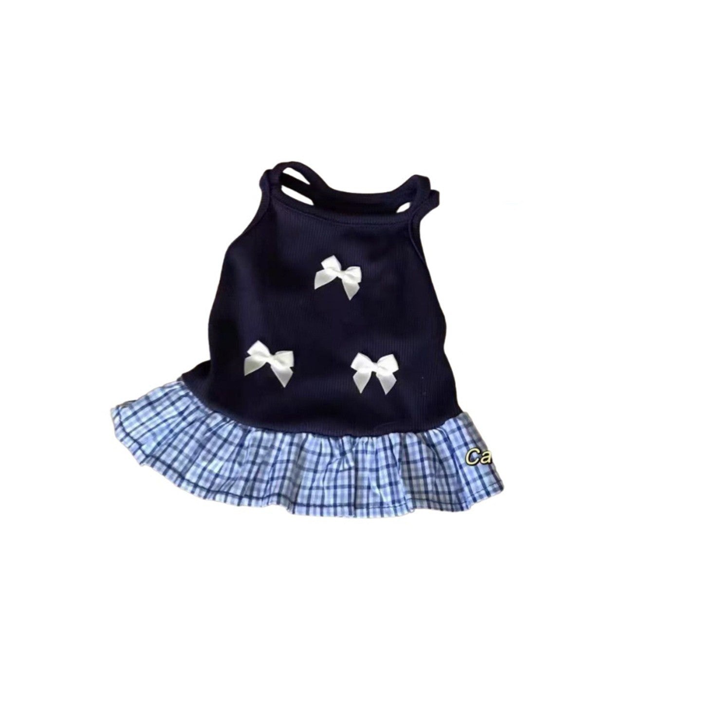 Small dog in a blue breathable vest dress with bows