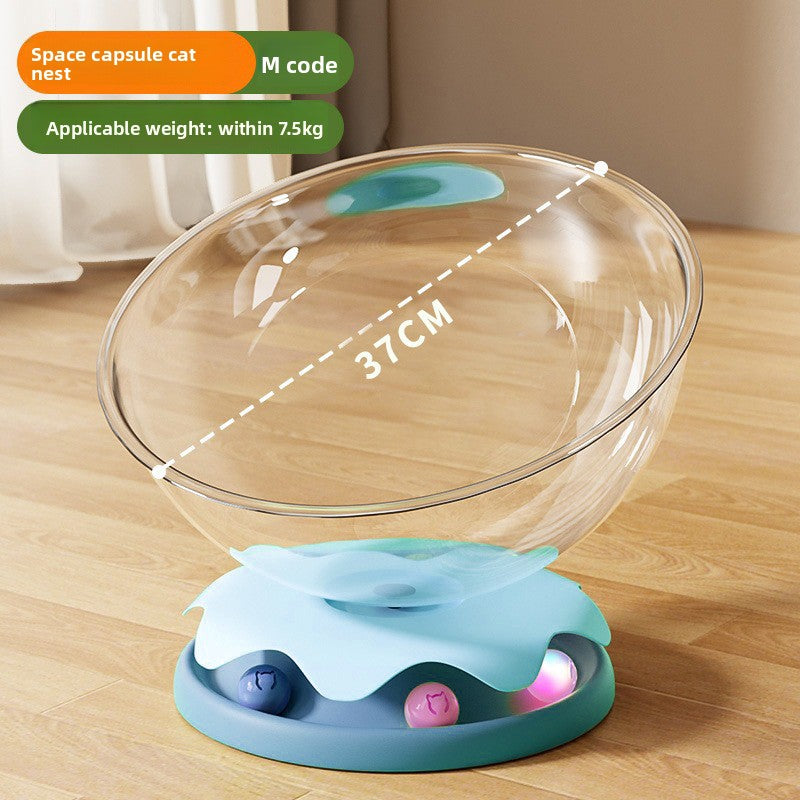 Clear capsule cat bed in transparent plastic with cream base, view 6