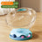 Clear capsule cat bed in transparent plastic with cream base, view 6