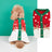 Christmas knitted pet jumper with festive design in Brown Antlers, in a home setting