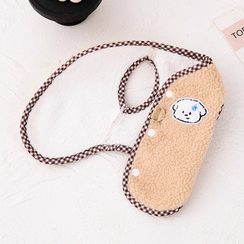 Fleece lined pet vest with back lead opening, in a home setting