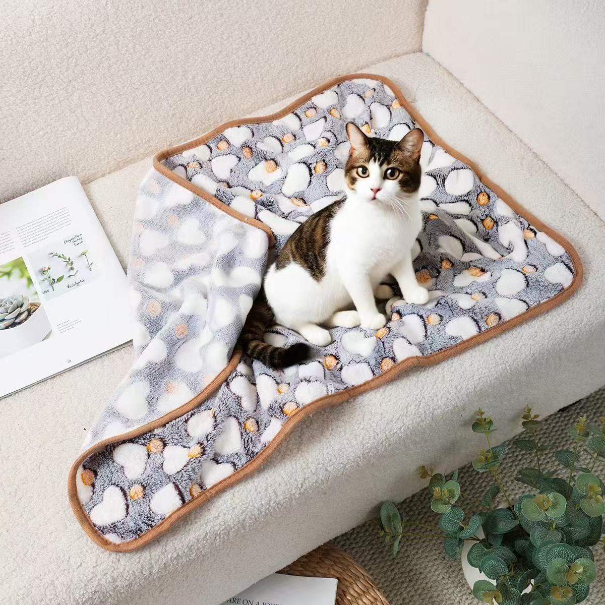Small coral fleece pet mat, close-up detail view