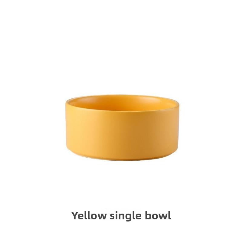 Raised glazed ceramic pet bowl on a stand in pastel yellow, view 28