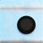 Compact white Bluetooth pet locator tag with silicone case, product image 1