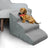 Grey non-slip foam dog stairs beside a sofa with a small Dachshund sitting on top
