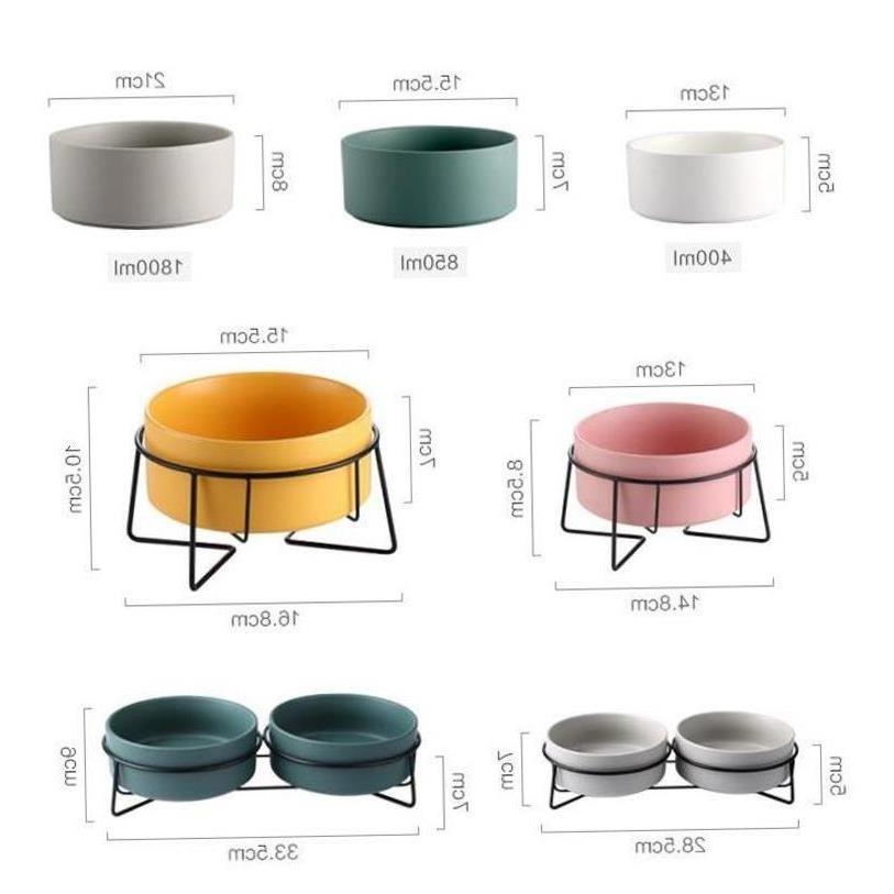 Raised glazed ceramic pet bowl on a stand in pastel yellow, view 3