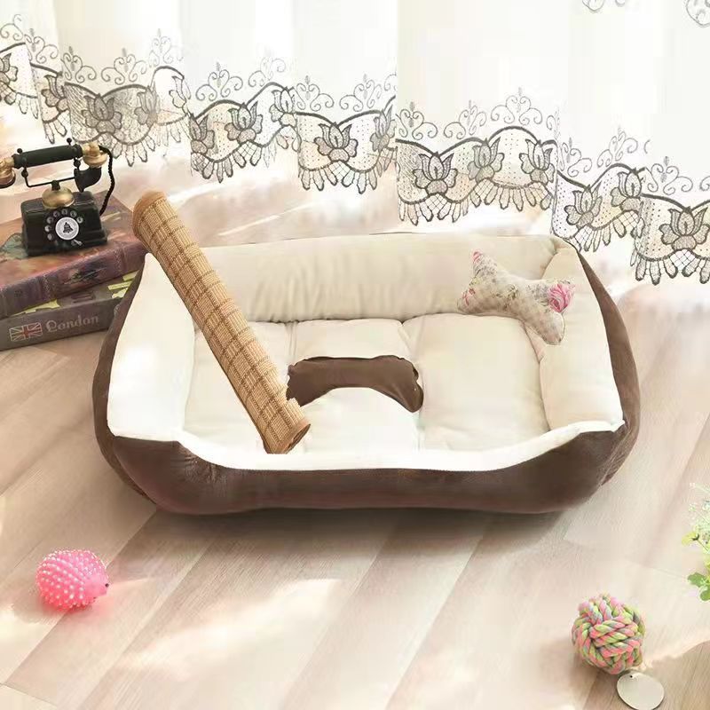 Soft pet bed with blanket, mat and bone pillow, close-up detail view