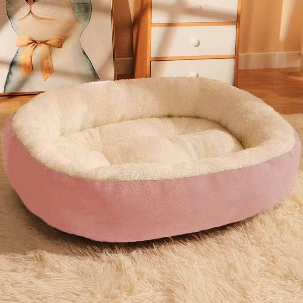 Green oval dog bed in 70 by 55cm size