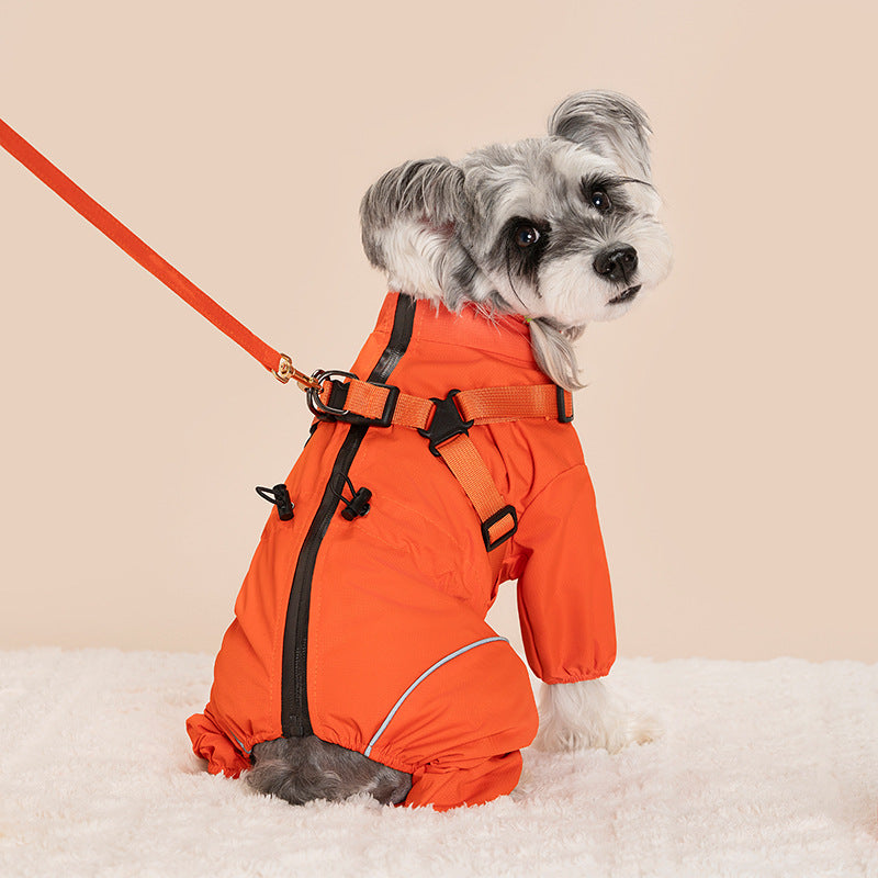 Dog wearing a red windproof four leg coat outdoors